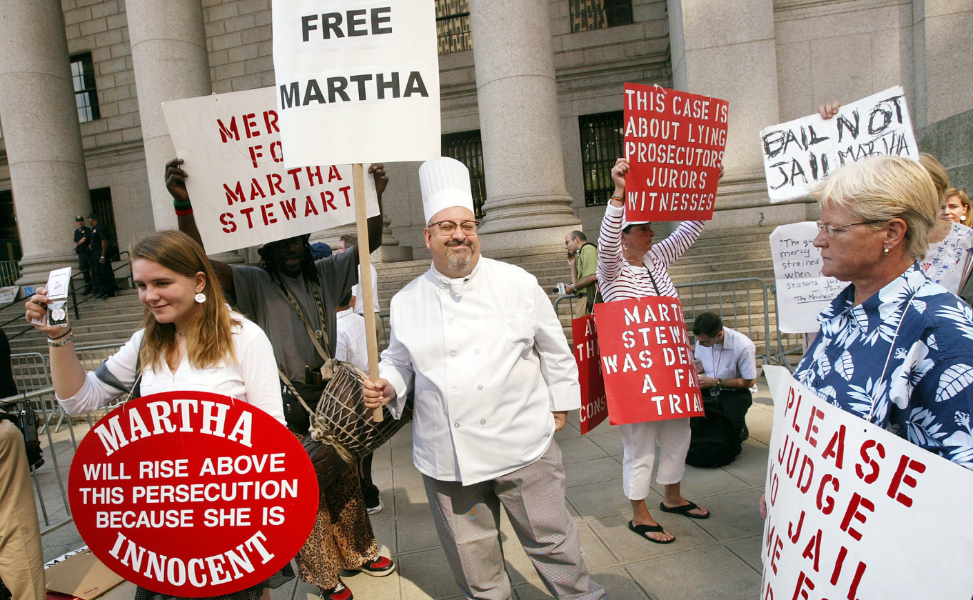 Supporters stand outside the courthouse during Stewart's sentencing hearing on July 16, 2004, in New York City.