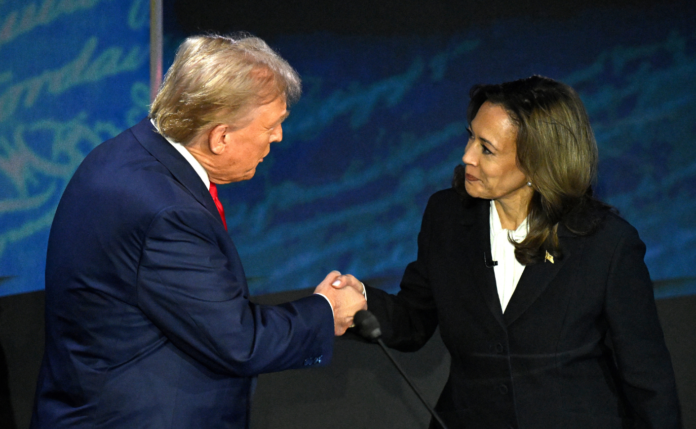 Donald Trump and Kamala Harris shaking hands at their debate