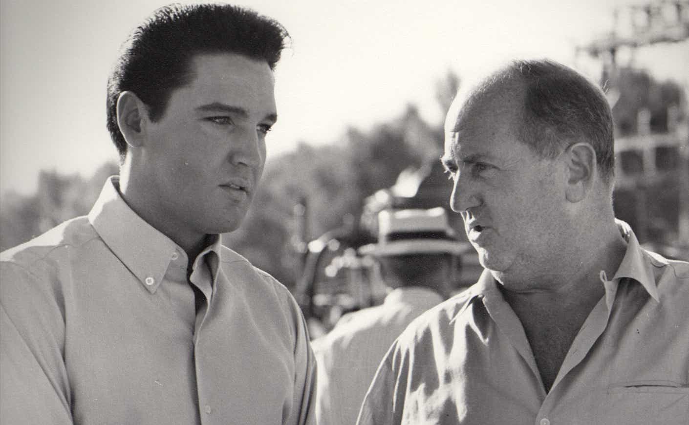 Elvis Presley talking to Colonel Tom Parker