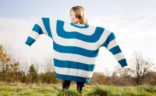 little girl wearing oversized sweater
