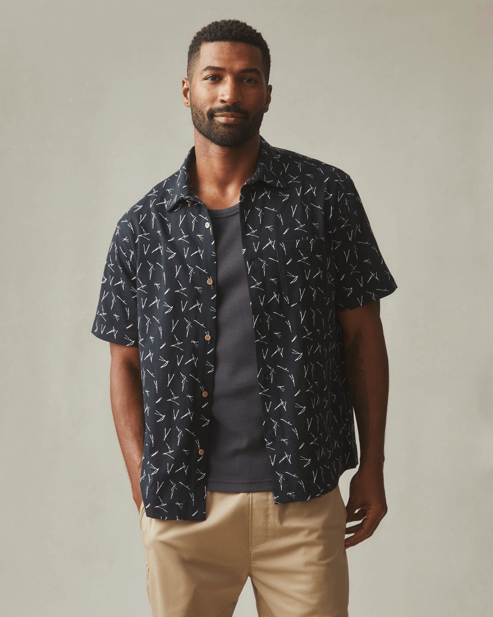american giant resort shirt on model