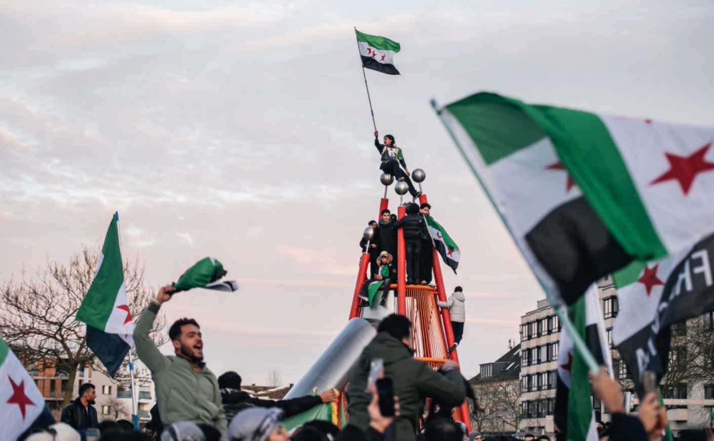 Syrians celebrating the end of Assad.