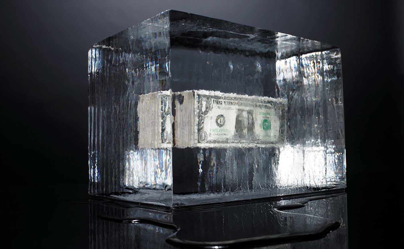 American dollars in a block of ice