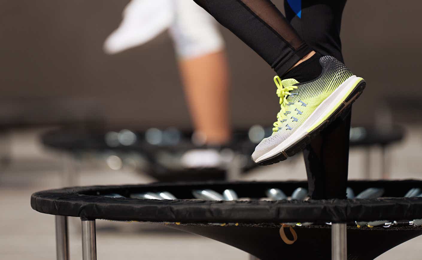 a person standing on a trampoline