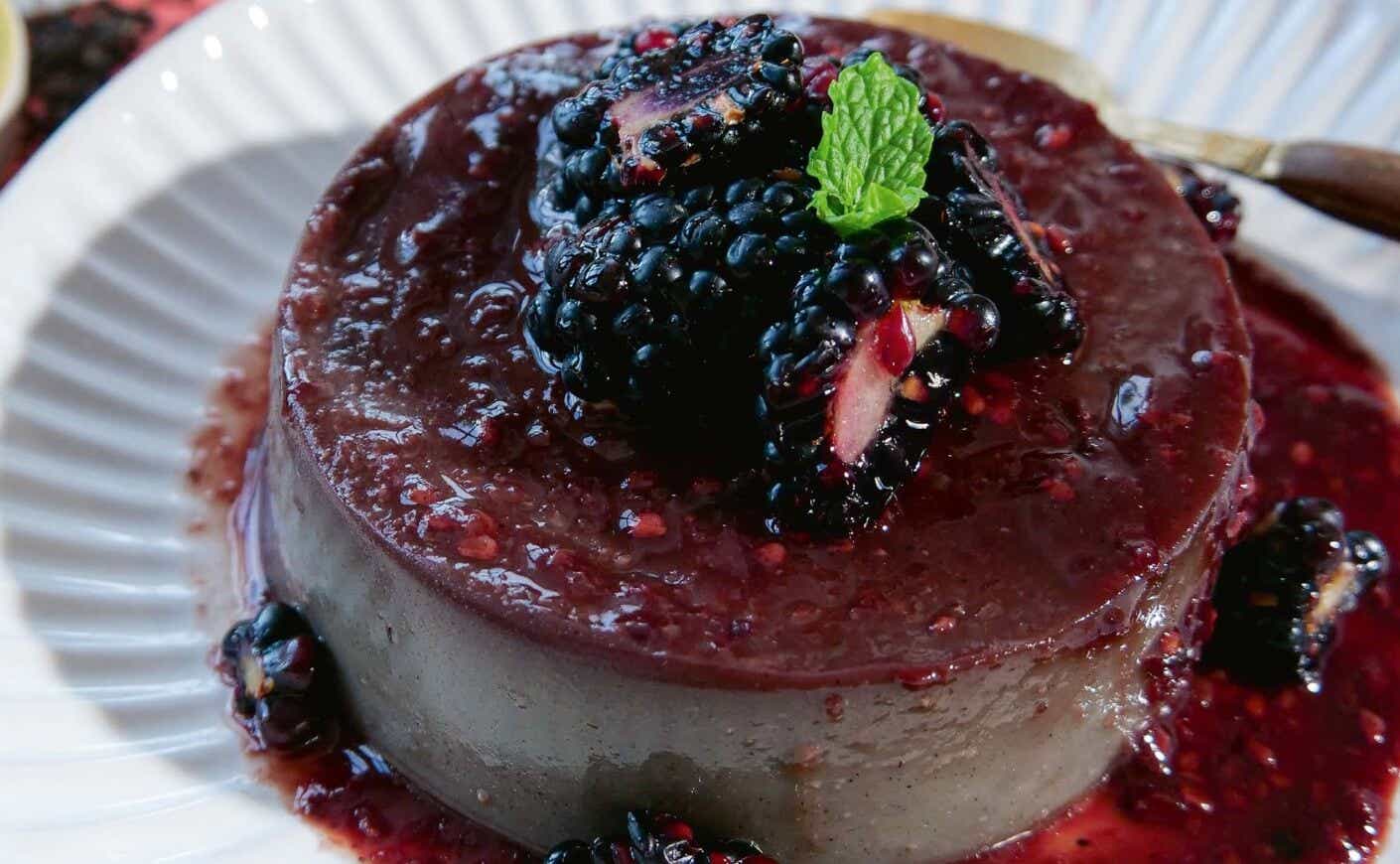 A dish containing a blackberry flan