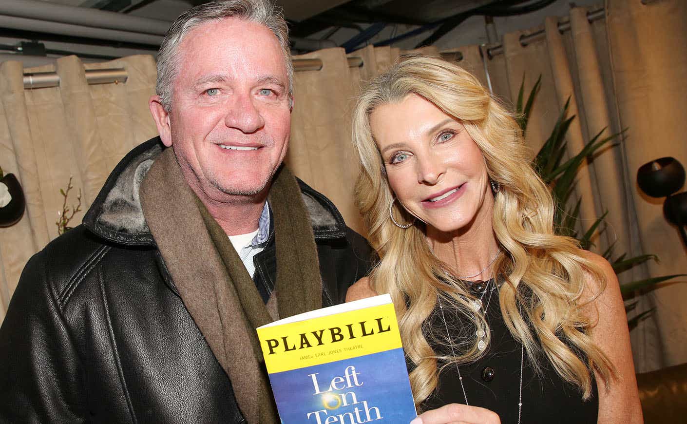 Joan Vassos and Chock Chapple holding up a Playbill for Left on Tenth