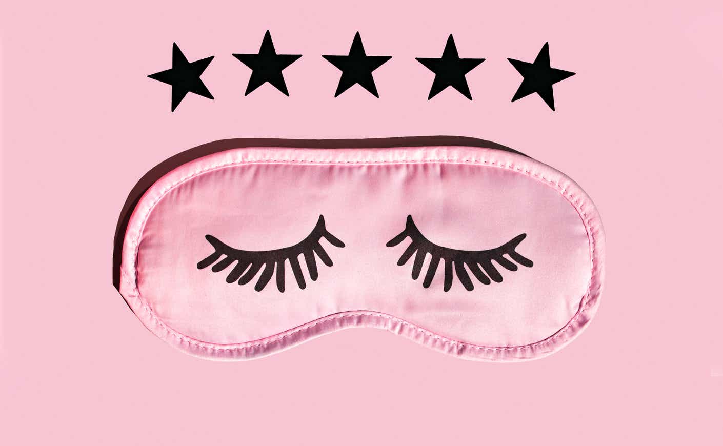 a sleep mask with five stars above it