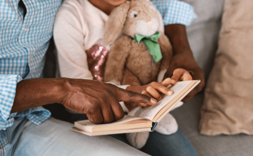 grandparent and child read book