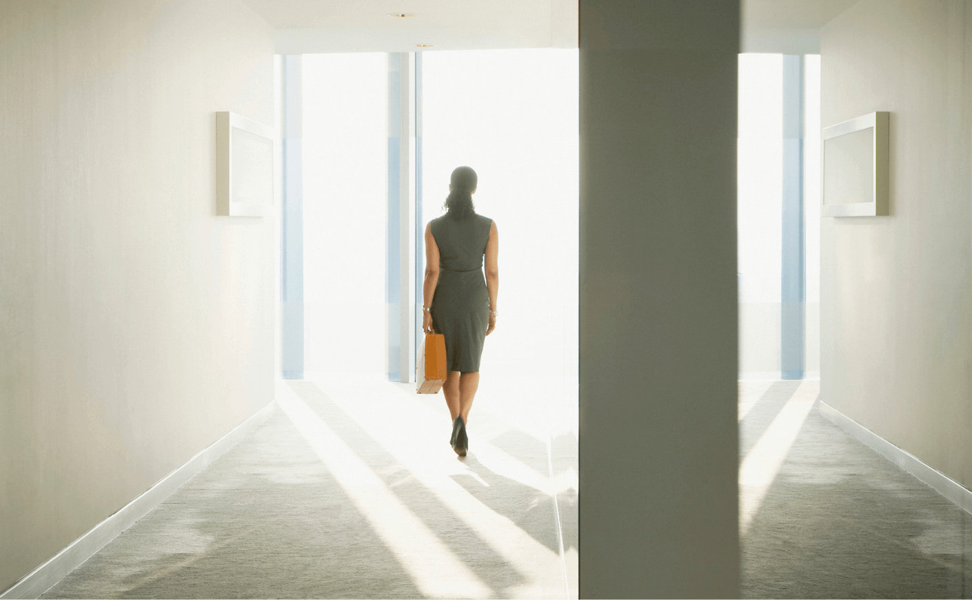 woman walking out of office