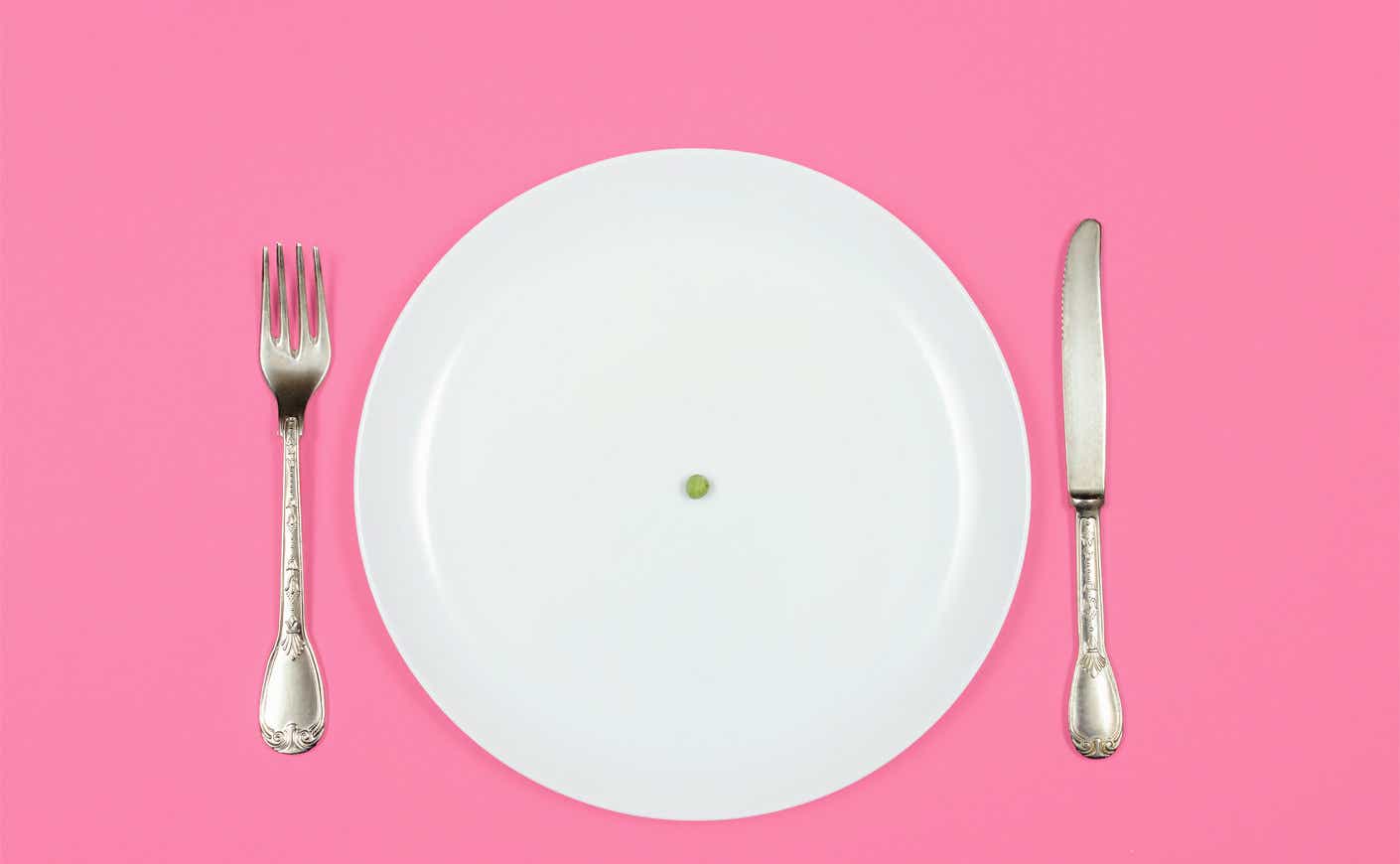 a plate with a pea in the middle
