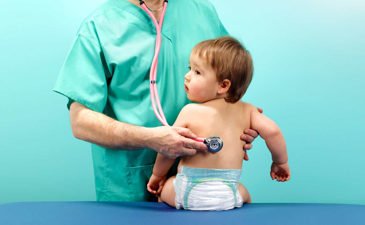 baby with doctor and stethoscope