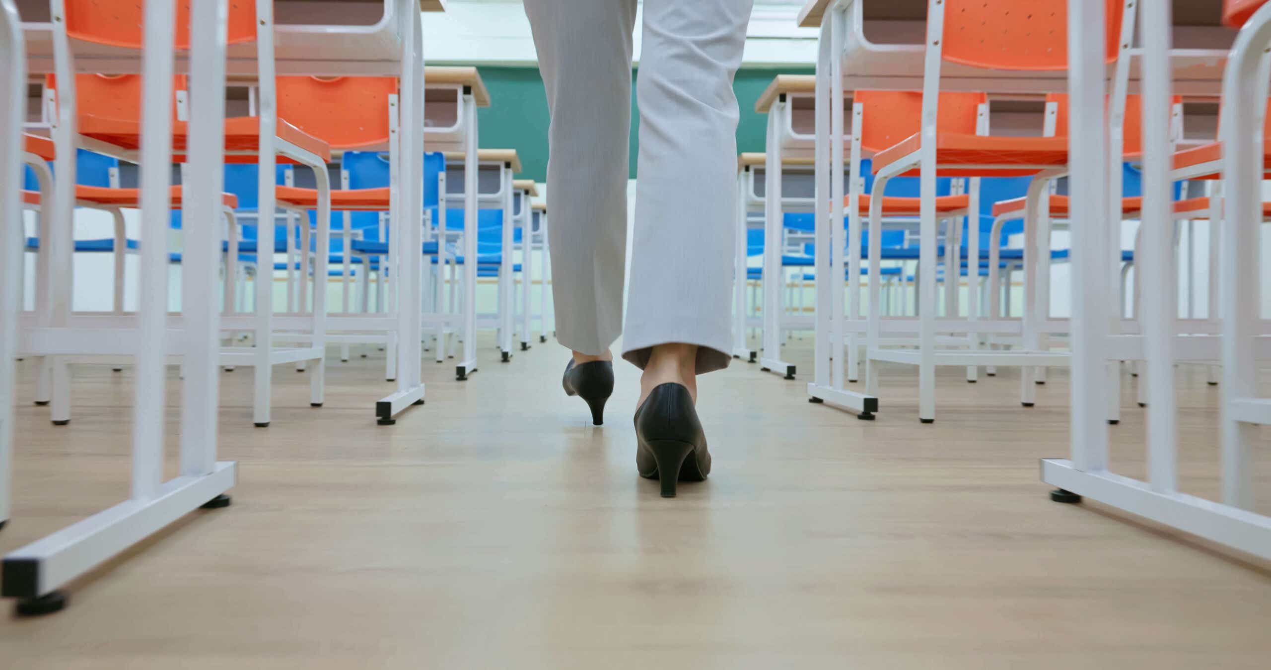 teacher walking through desks