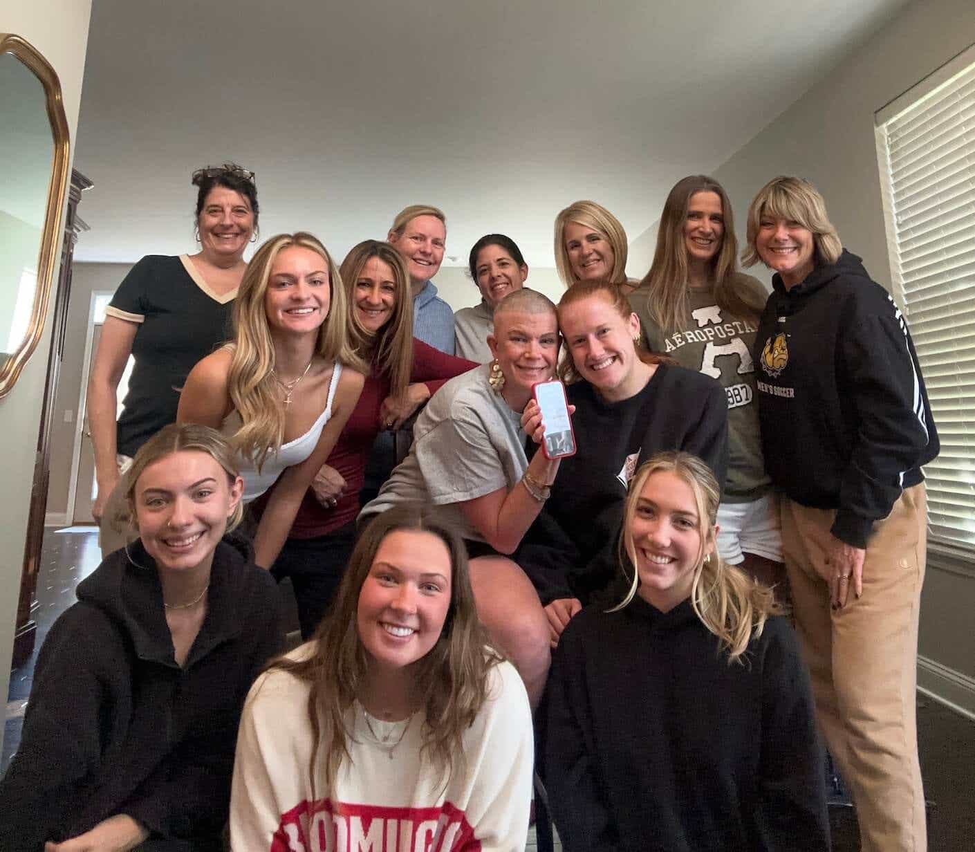 a group of woman smiling