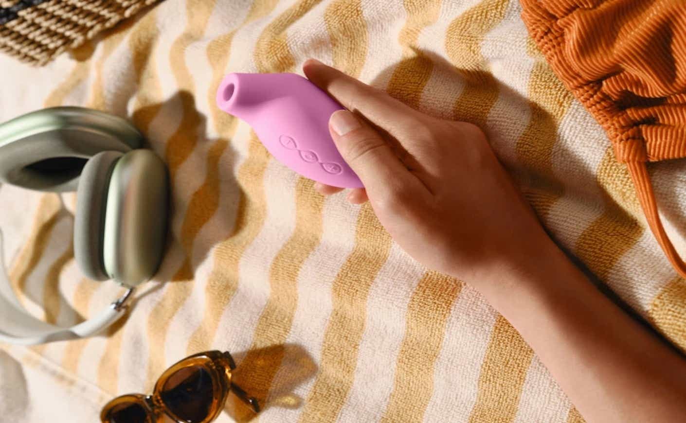 woman holding a vibrator