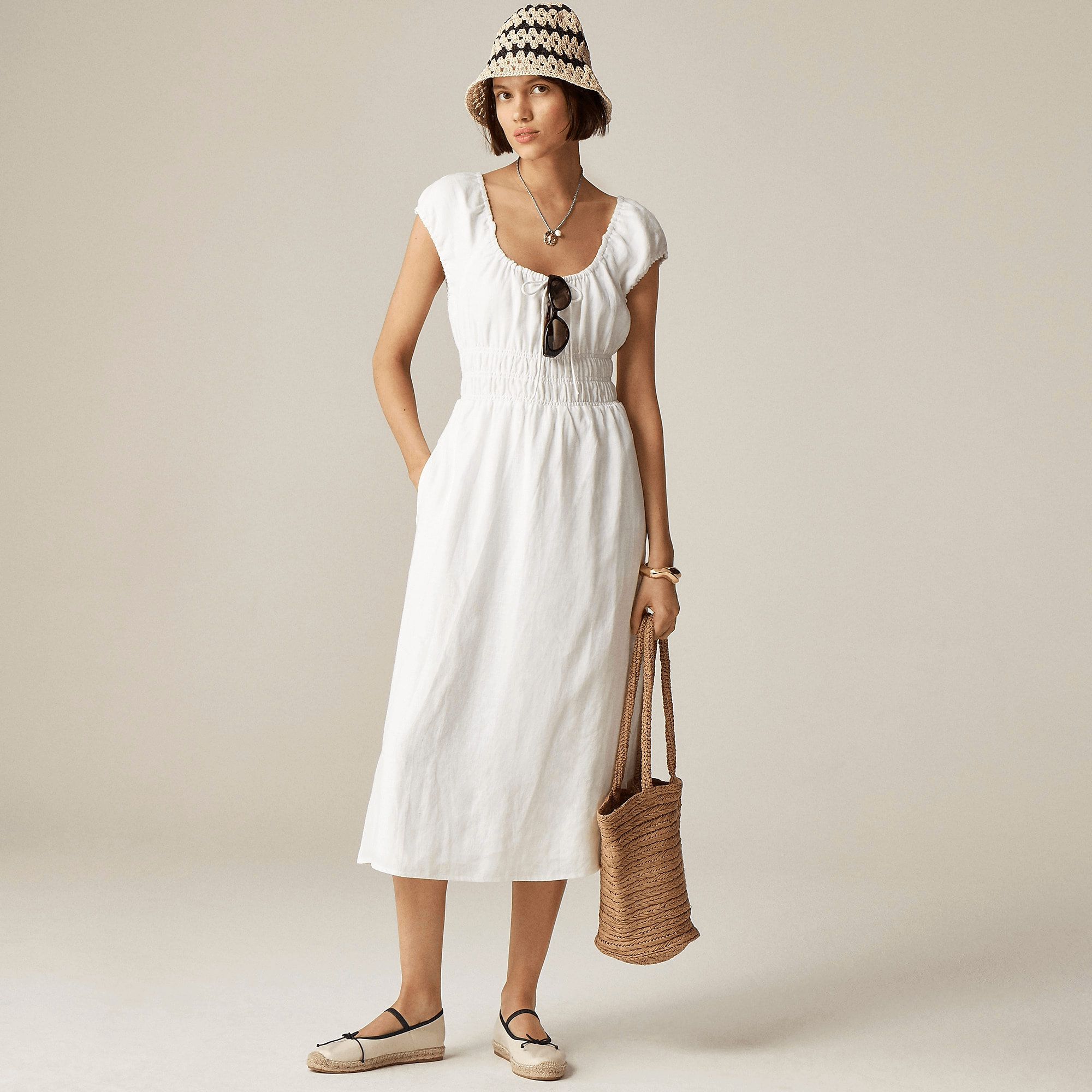 model in white j.crew dress