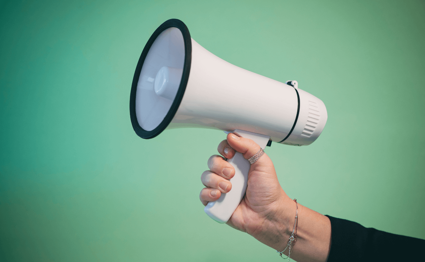 hand holding megaphone