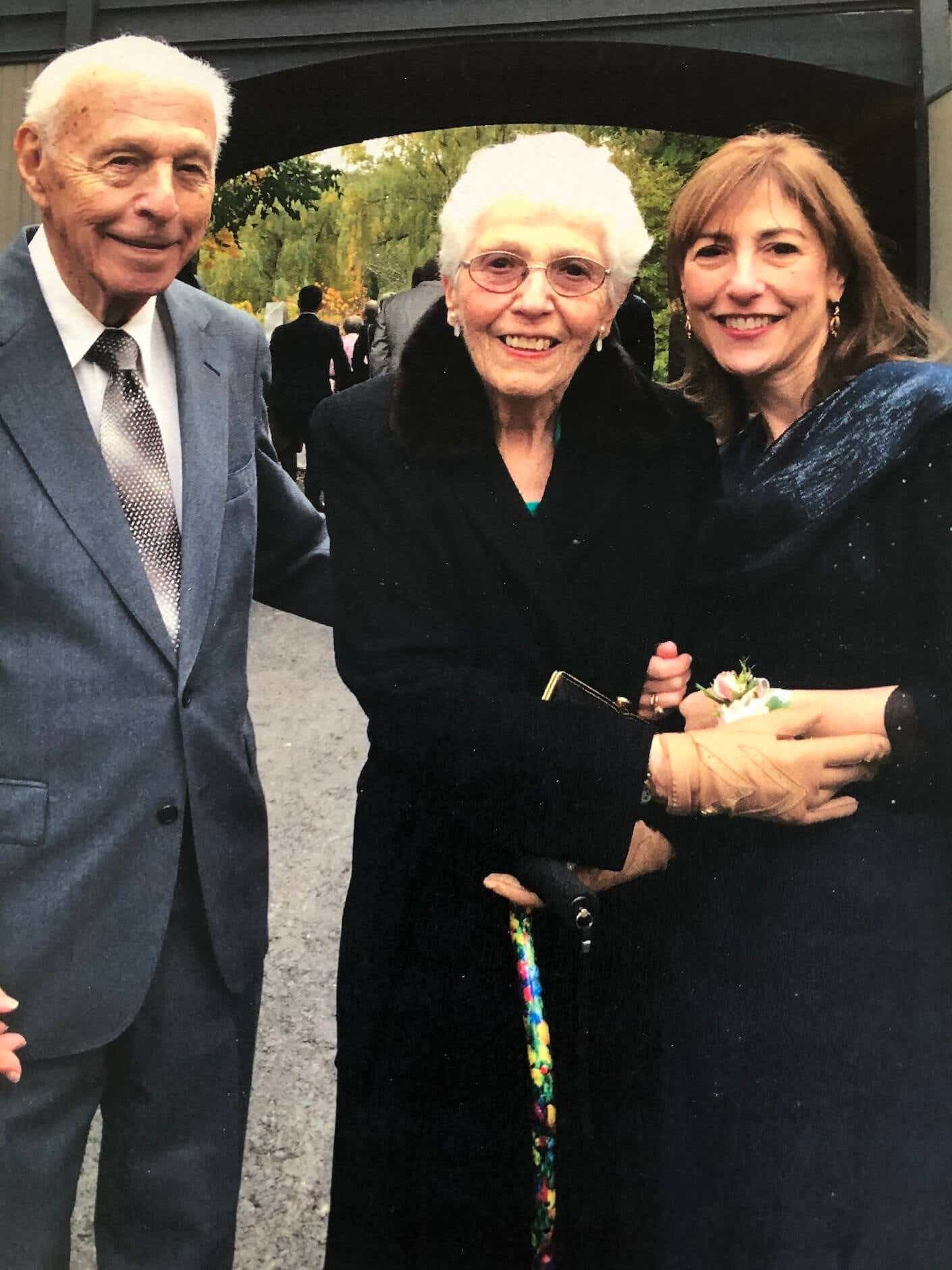 an elderly couple and a middle aged woman 