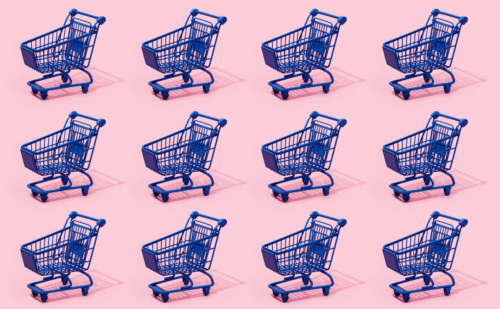 A grid of blue shopping carts against a pink background.