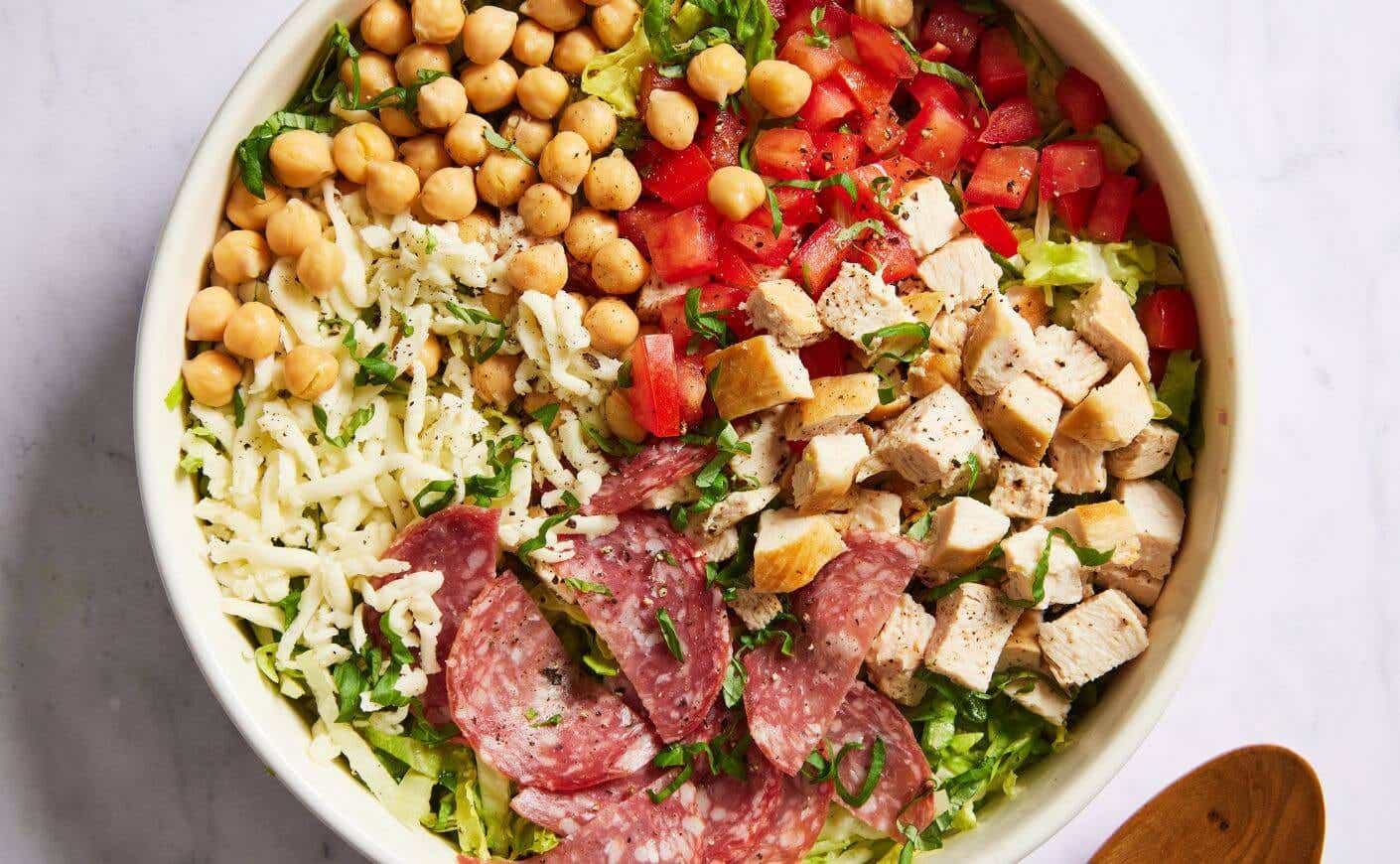 A bowl of chopped salad.