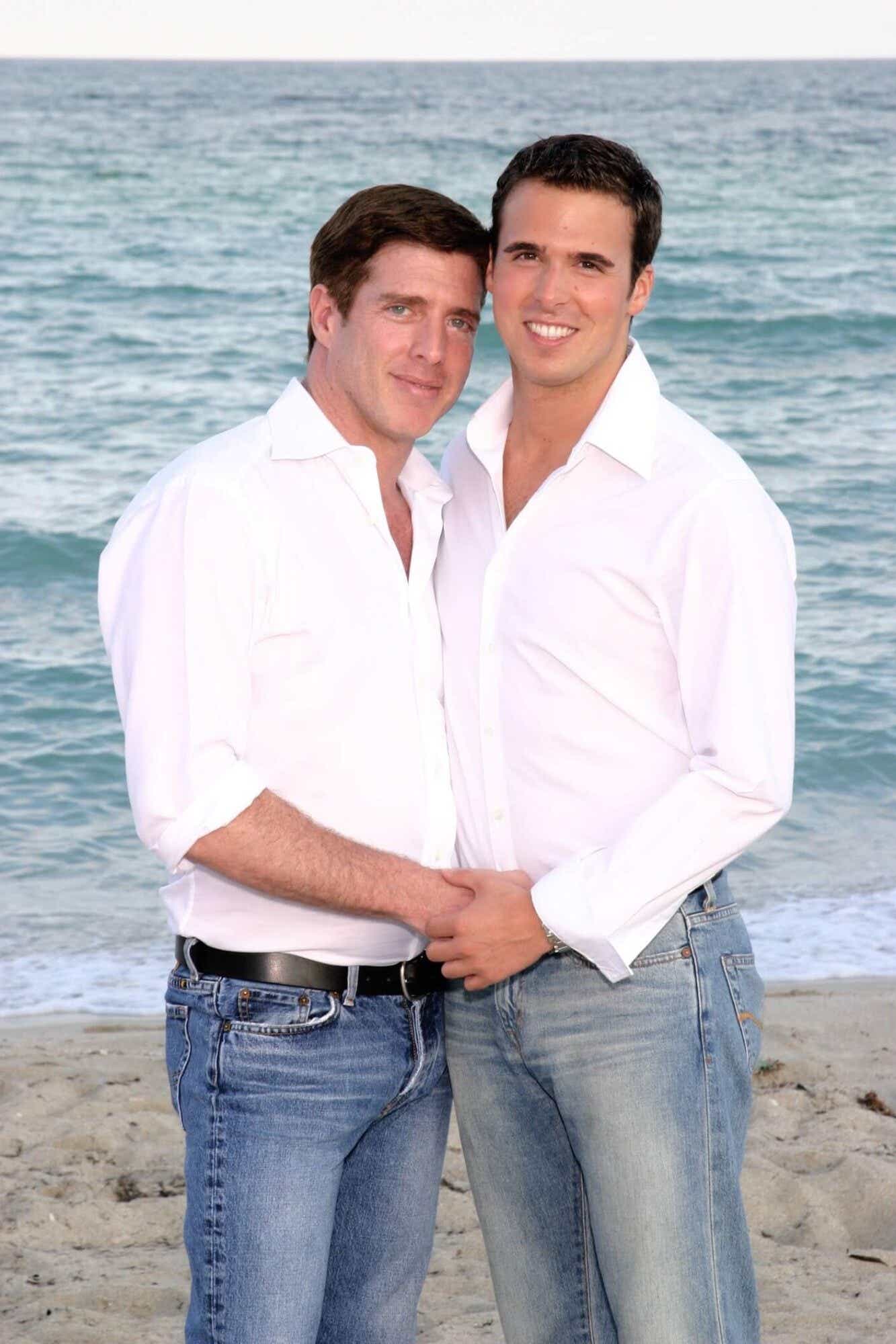 Terrence Mack and his late husband Rand on a beach