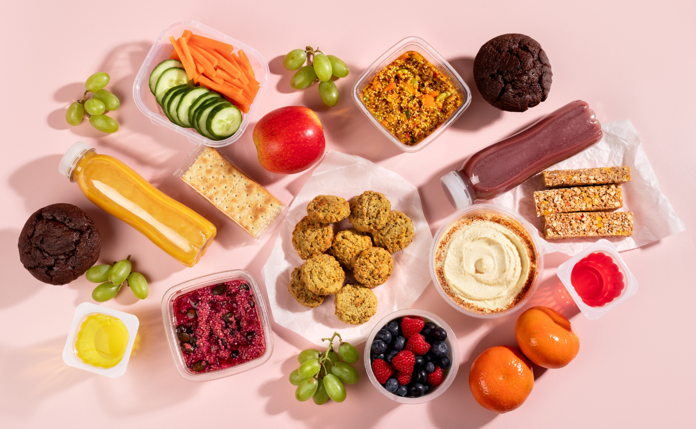 Ingredients from a meal kit spread on a table