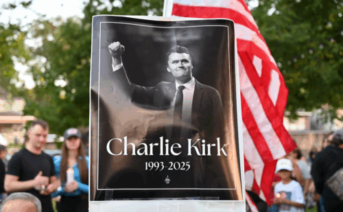 A memorial sign for Charlie Kirk