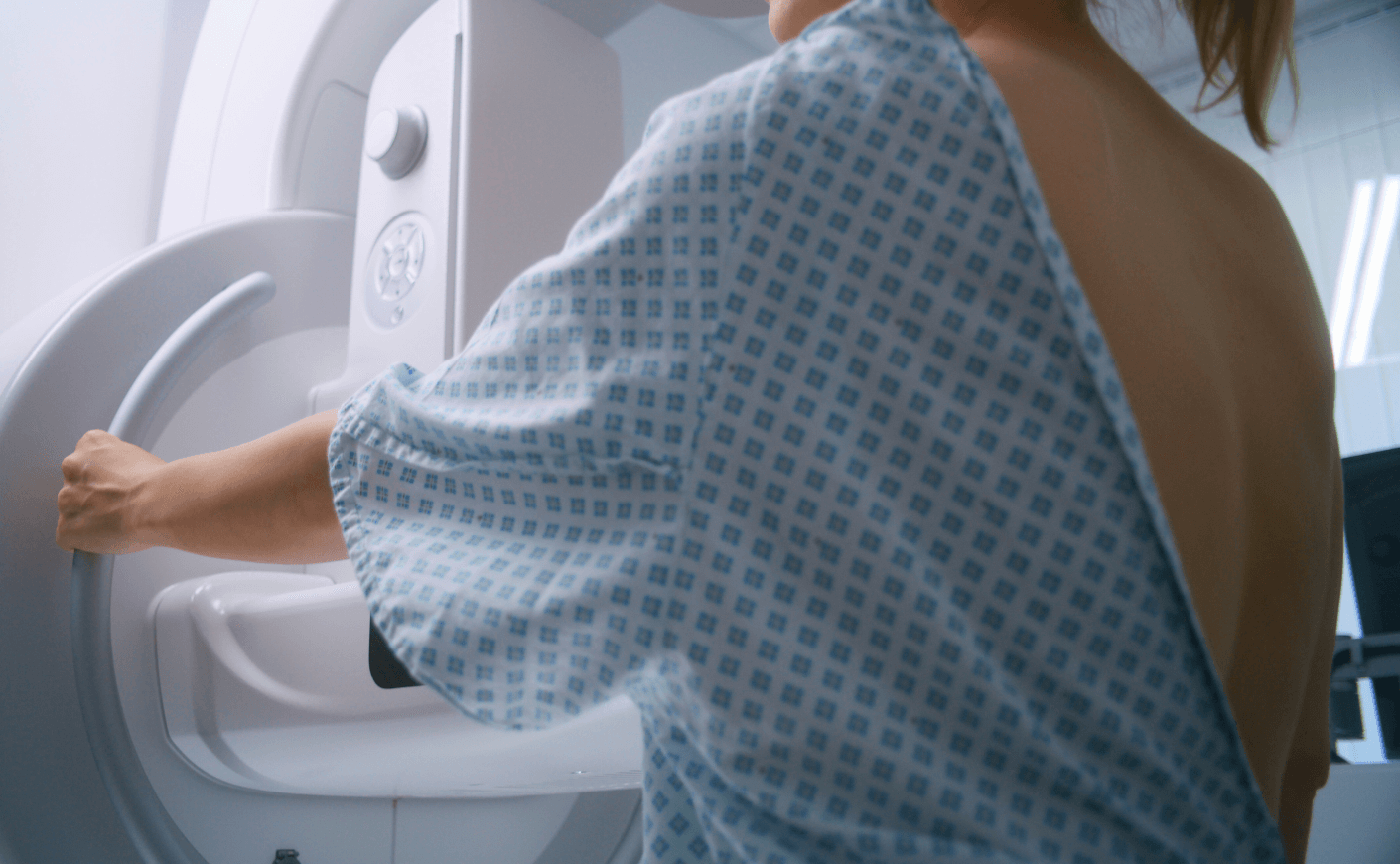 woman getting mammogram