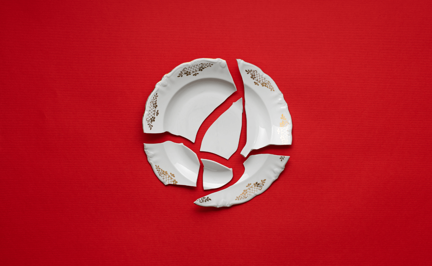 broken plate on a red background
