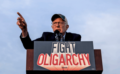 Bernie Sanders at a podium that reads "Fight Oligarchy"