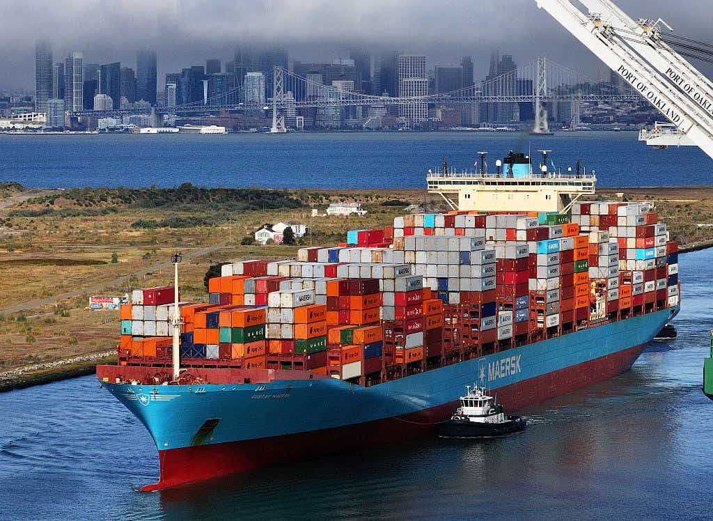 A ship in Oakland, California carrying crates of goods from overseas