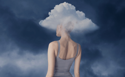 Illustration of a woman whose head is hovering in hazy clouds