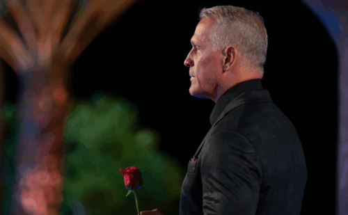 Mel Owens holding a rose