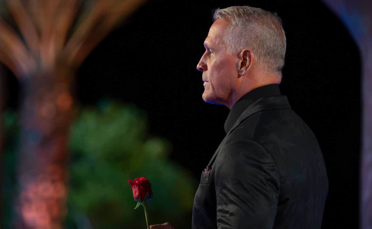Mel Owens holding a rose