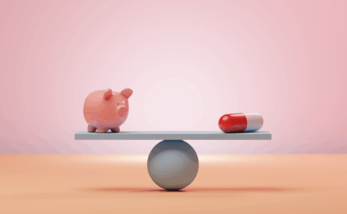 A scale with a piggy bank on one end and a red and white pill capsule on the other