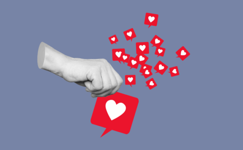 a hand holding a heart surrounded by smaller hearts