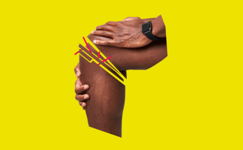 Hand holding knee on yellow background