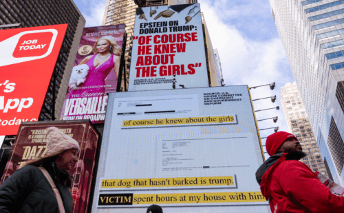 Billboards containing a line from Epstein's emails: "of course he knew about the girls"
