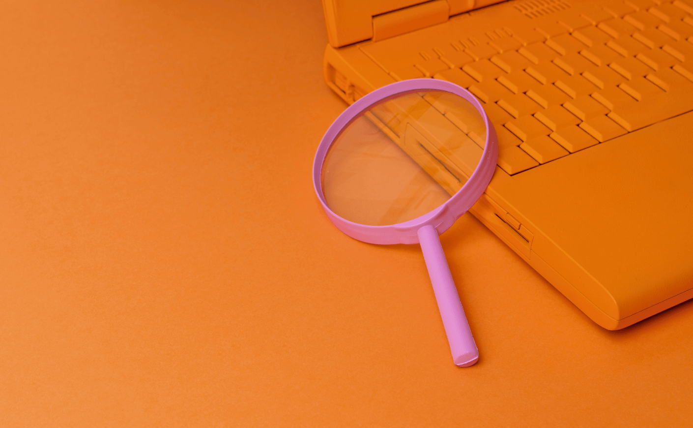 magnifying glass on a laptop