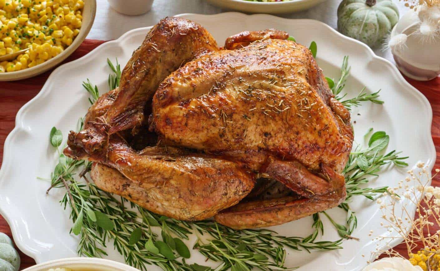 A dry brined turkey on a platter.