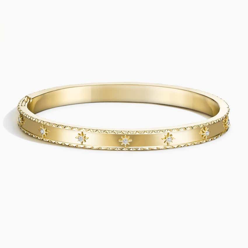 Gold bangle with diamonds with star designs