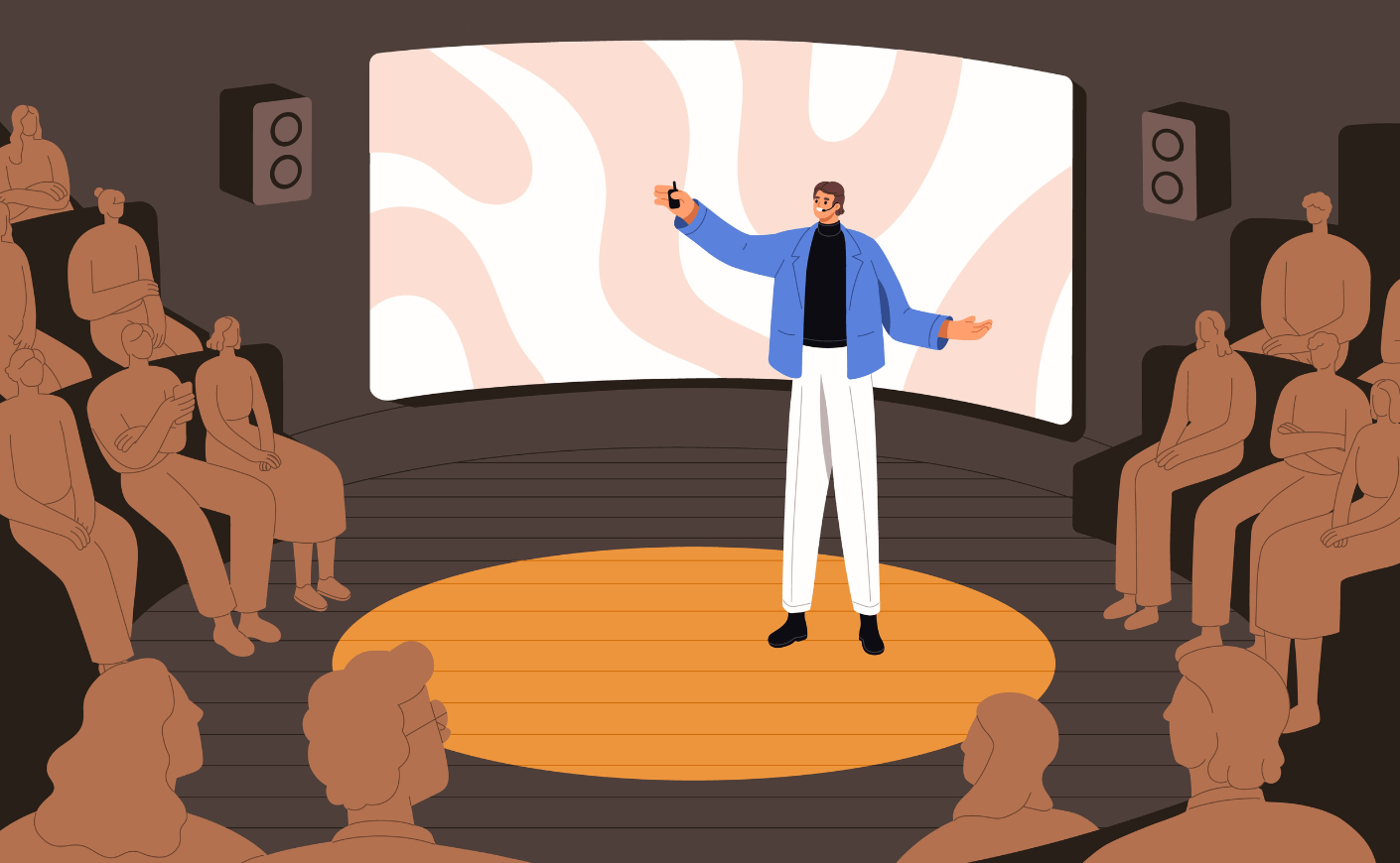 man speaking on stage