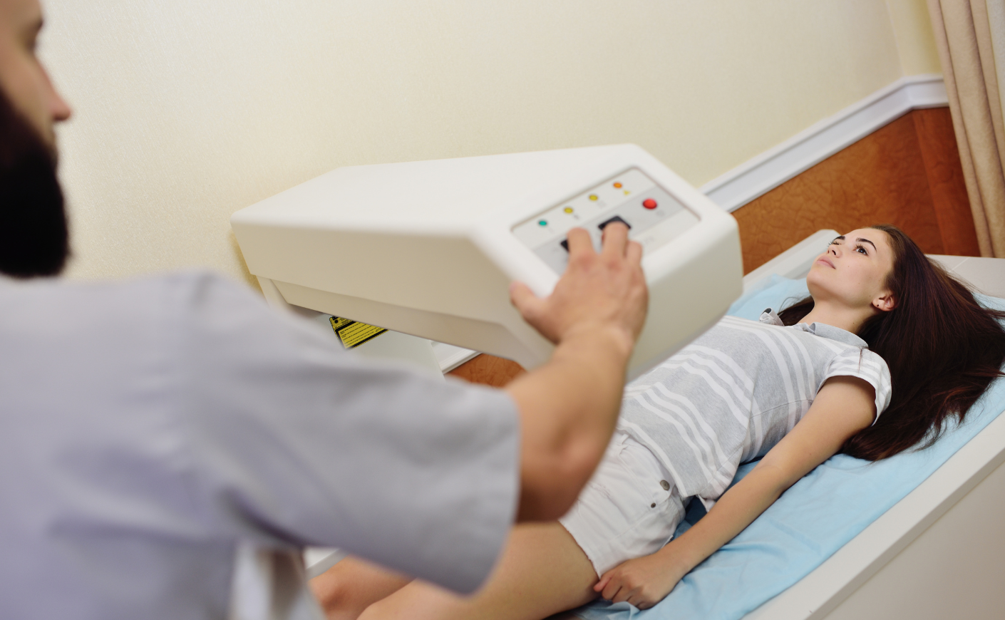 a woman getting a dexa scan