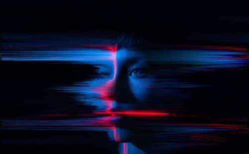 A young woman's face glitching and fragmenting.