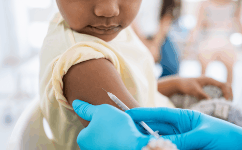 child getting vaccine
