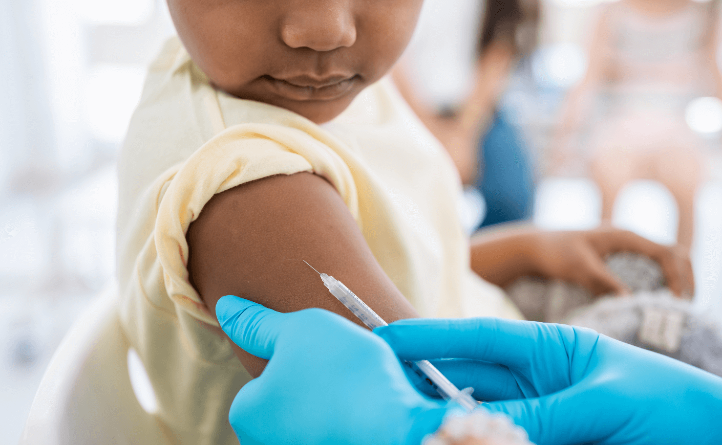 child getting vaccine