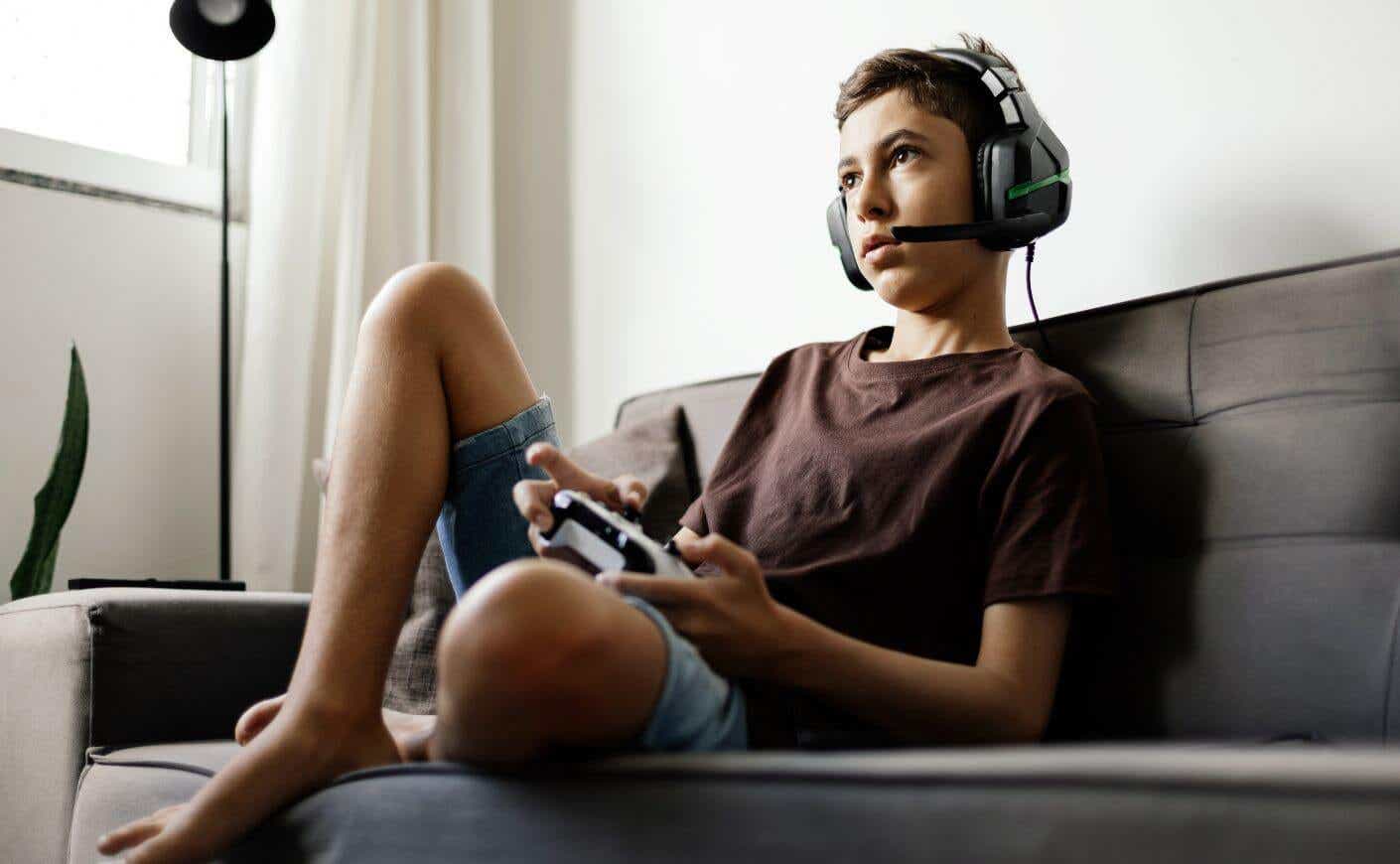 A teen gaming.