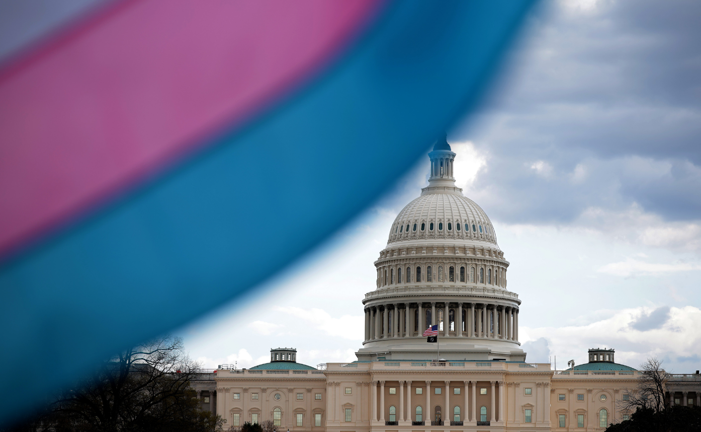 Trans flag flying in front of the U.S. Capitol