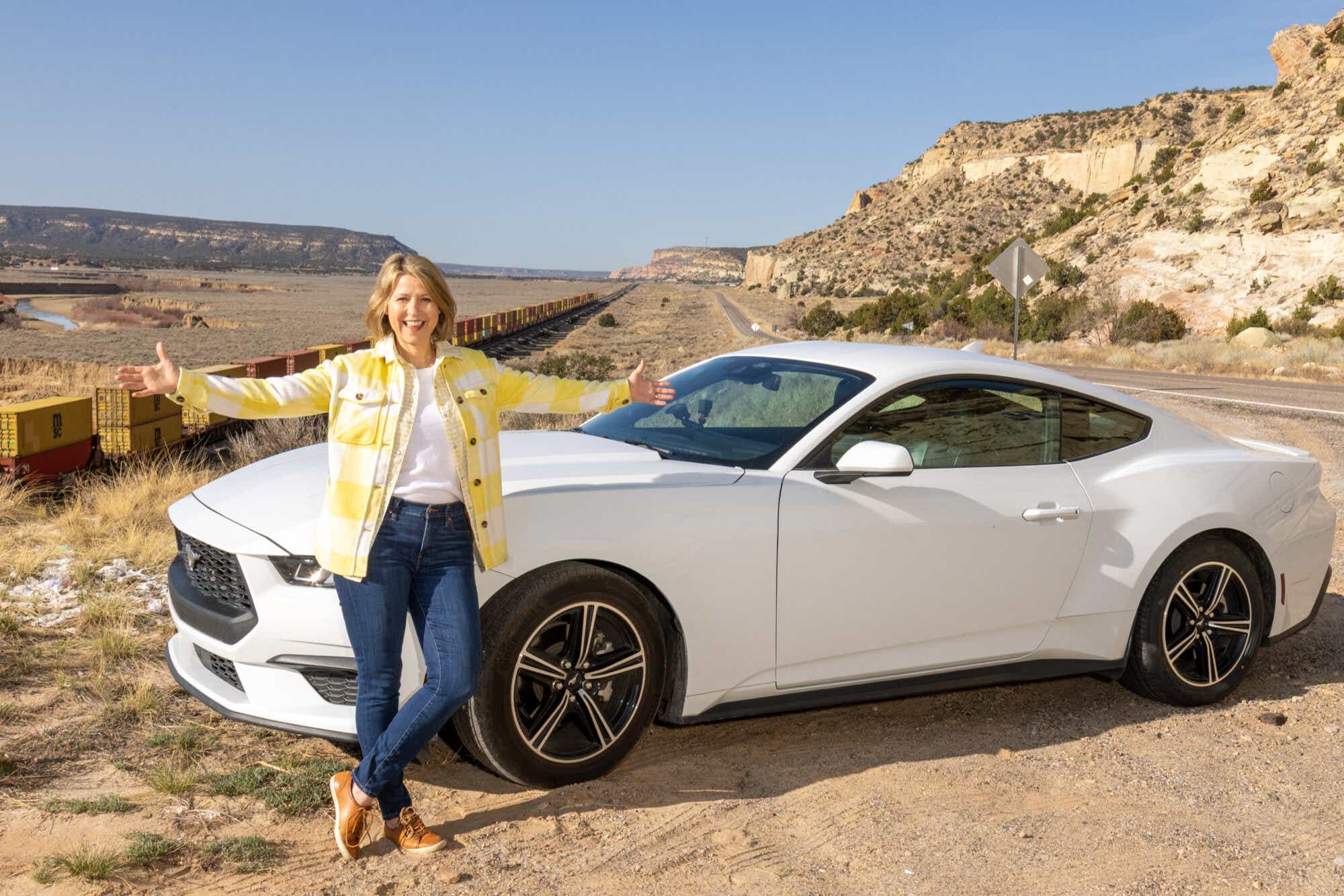 Samantha and her Mustang on Route 66 in New Mexico by Samantha Isom