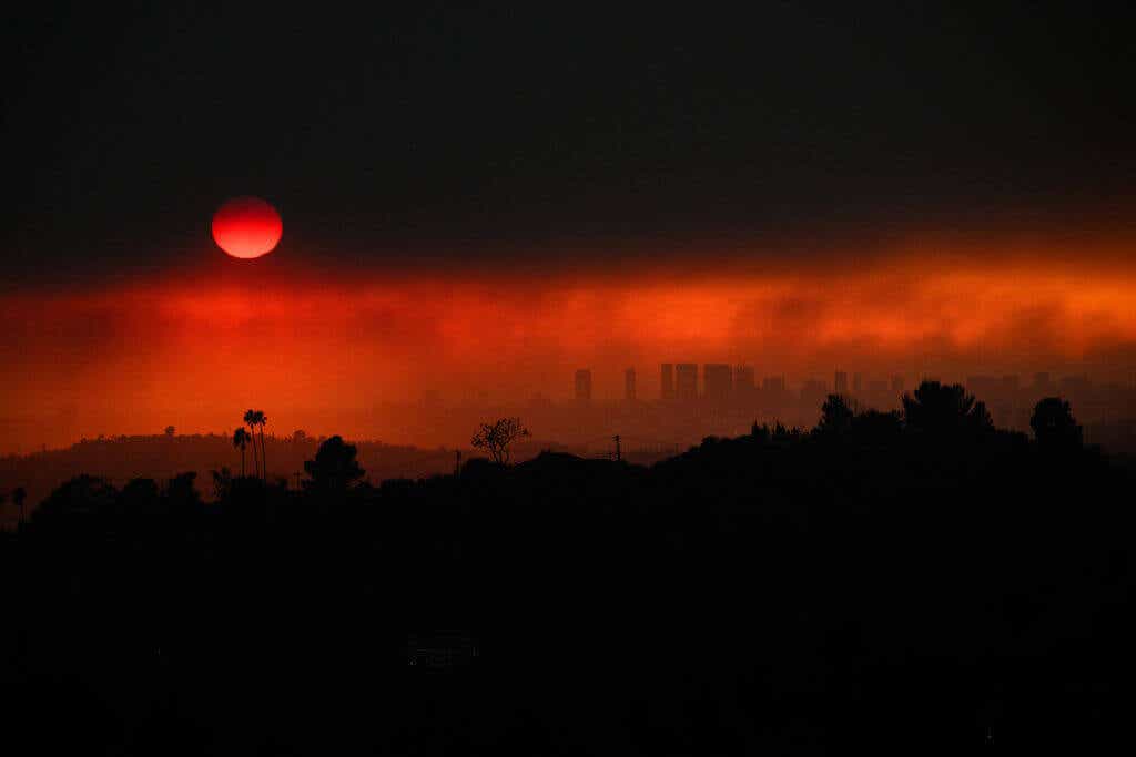 The city of L.A. glowing red from fires.