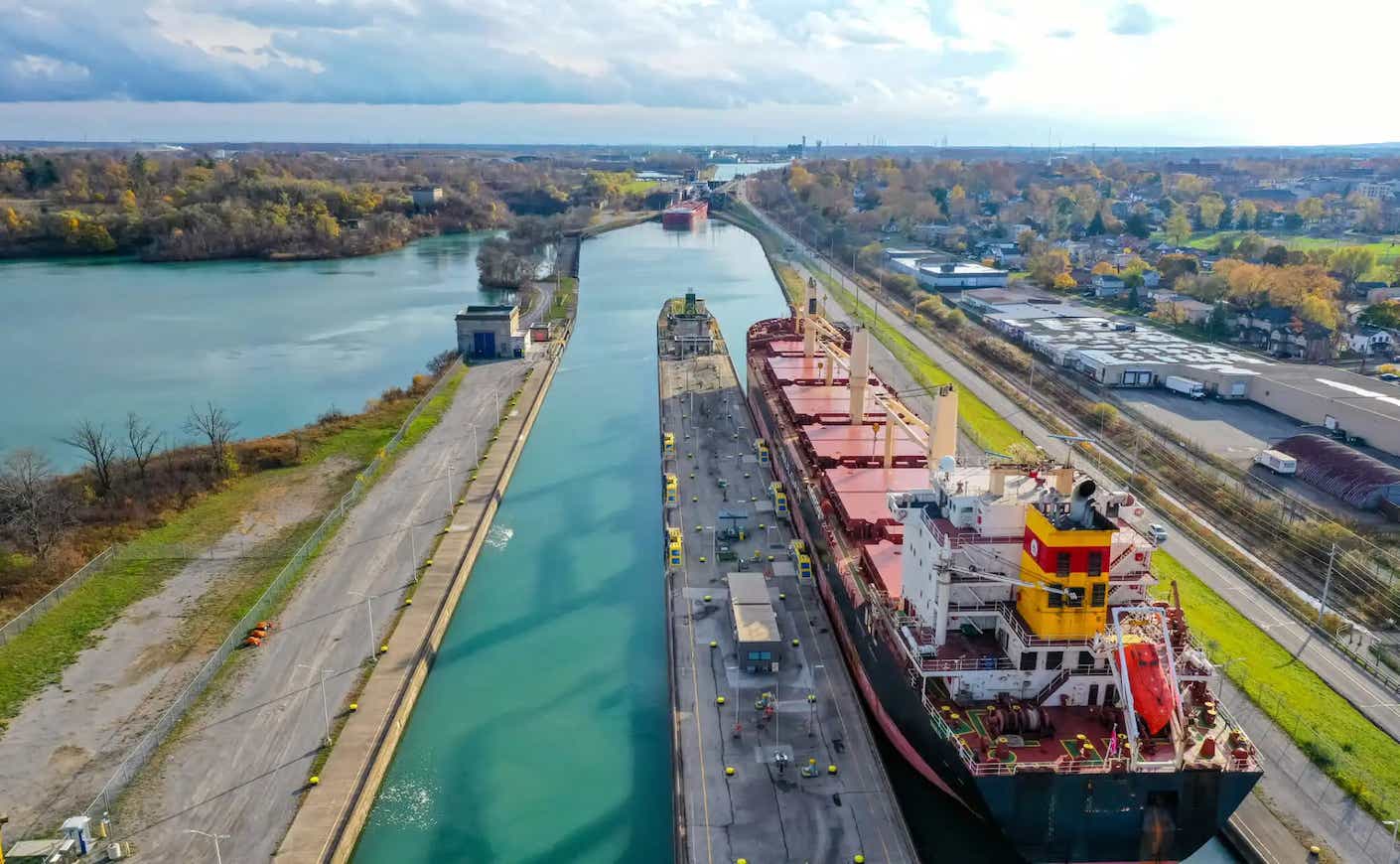 aerial view of the great lakes with a large freight ship